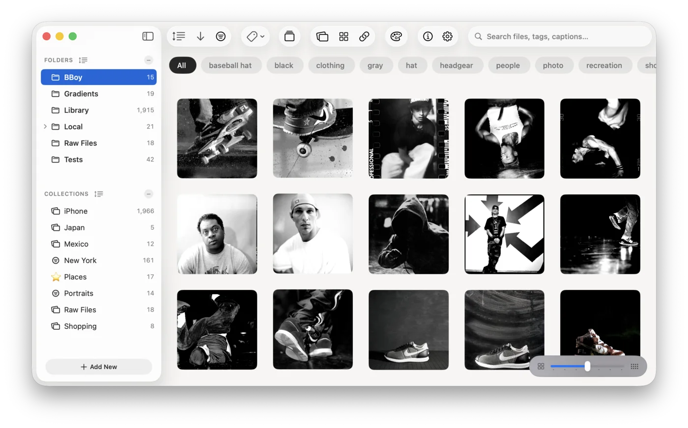 Muse showing a black-and-white photo collection in the library.